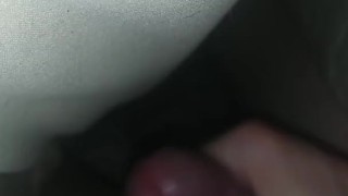Masturbating