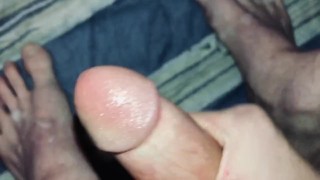 Big Dick Stud Cums on his own Feet