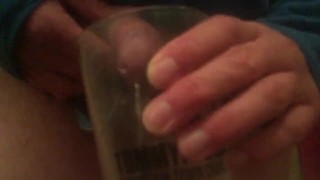 Slow mo piss in cup