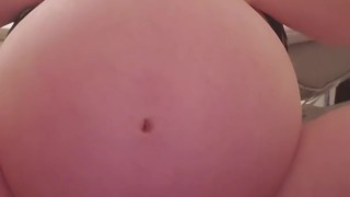 Hugely pregnant girl shows off her unborn