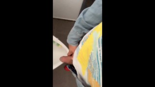 Fat soft cock piss at an public urinal