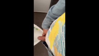 Fat soft cock piss at an public urinal