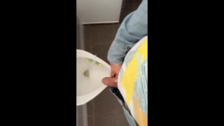 Fat soft cock piss at an public urinal
