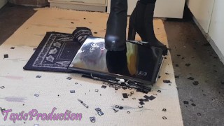 Laptop crushed under sexy high heels