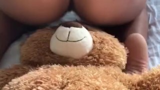 BABYSITTER PLAYS WITH TEDDYBEAR