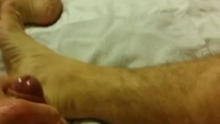 Sexy verbal guy cums on feet