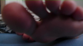 I relax my tired and stinky feet in front of your face pov