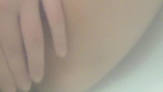 Girl's caressing her body (tits and pussy) in bath. CLOSE UP. Underwater