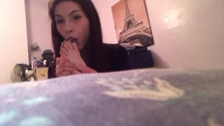 Misbehaving young slut licks her feet on parents bed 