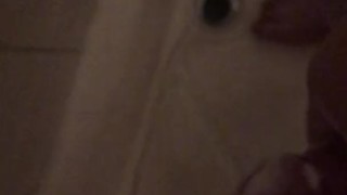 Stocky guy jerking off his soapy cock in the shower with cumshot