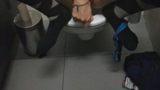 Public restroom masturbation with a carrot while people are around