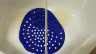 Public urinal piss
