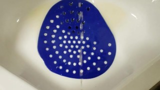 Public urinal piss