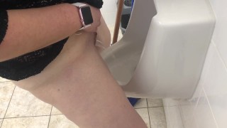MILF stands and pees in mens urinal