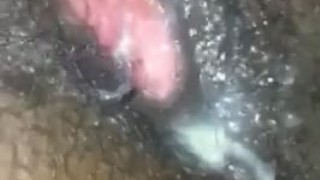 Thick ebony plays with creamy pussy.