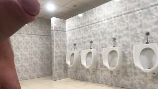 Small cock play in public toilet, got scared when man came out of cubical 
