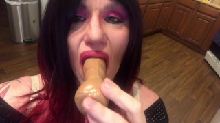 Cassie giving special attention to dildo
