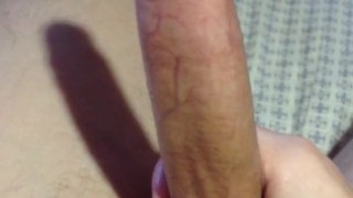 Teen oiled up big cock and plays with it.