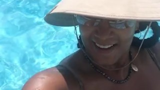 Big titted Ebony having fun in the Sun, cooling off in the the pool!