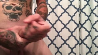 Hot tattooed guy shaves himself and masturbates. 