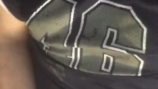 Dirty talking football player cums on his jersey 