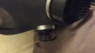 Playing with Vibrator in Shiny Down Jacket Gas Mask and Shiny Leggings