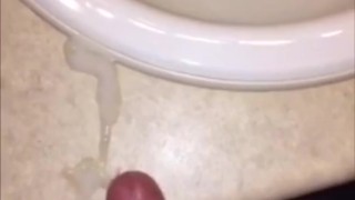 Quick jerk off session in the bathroom. Big cumshot on the counter.