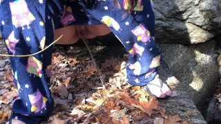Wife pissing outside in the leaves