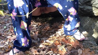 Wife pissing outside in the leaves