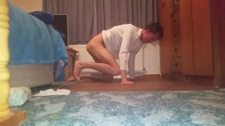 Very skinny teen in white long sleeve shirt strokes his cock