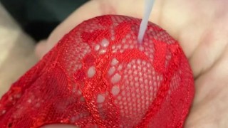 Big watery cum shot through red mesh thong whilst watching porn