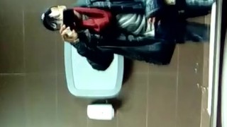 jerking off in public bathroom