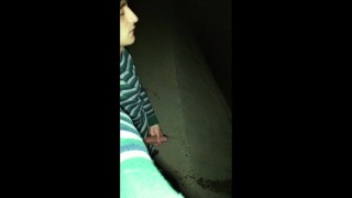 Twink pisses with erection under the bridge - uncut cock