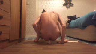 Skinny twig rides a dildo while in a long white shirt