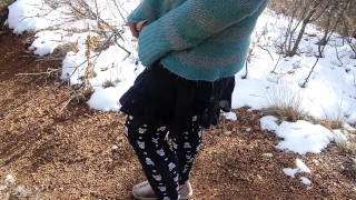 Transgirl pissing in public on a snowy trail