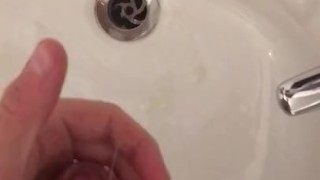 Teen wanks and cums in sink