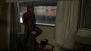 spiderman jerking off watching construction workers from his hotel window