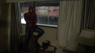 spiderman jerking off watching construction workers from his hotel window