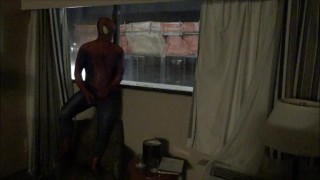 spiderman jerking off watching construction workers from his hotel window