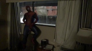 spiderman jerking off watching construction workers from his hotel window