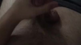 Masturbates and cums on body