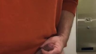 Jerking off my uncut cock at work & cumming on company time in the bathroom