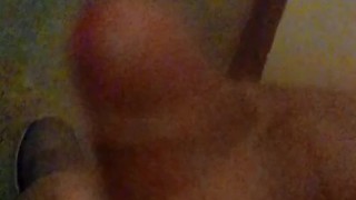 Masturbating