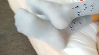 Sniff my long socks POV ( showing christmas socks to the camera lens )