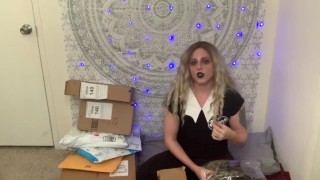 Goth camgirl unboxes sexy supplies for Easter cam show