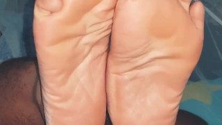 Showing my sexy feet soles and playing with my toes