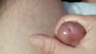 Shooting a big load of cum on my leg.