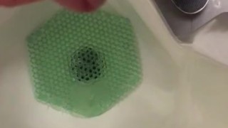 Almost Caught in action at the urinal Pinching off/on Janitor saw wet floor