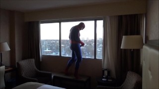 spider shoots onto hotel window