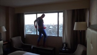 spider shoots onto hotel window